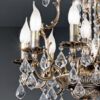 Brass and crystal chandelier with 9 lights in baroque style